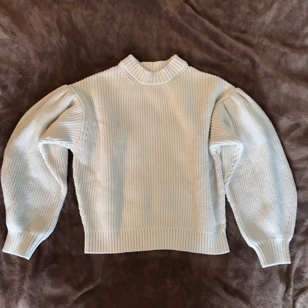 White puffy sleeve knit sweater.
